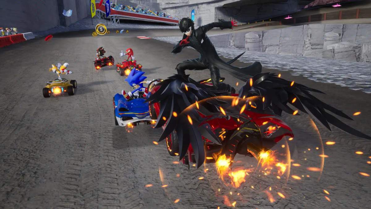 Sonic Racing: CrossWorlds oyunundan Sonic ve diğer crossover karakterlerin arabalarla yarıştığı oynanış görüntüsü.